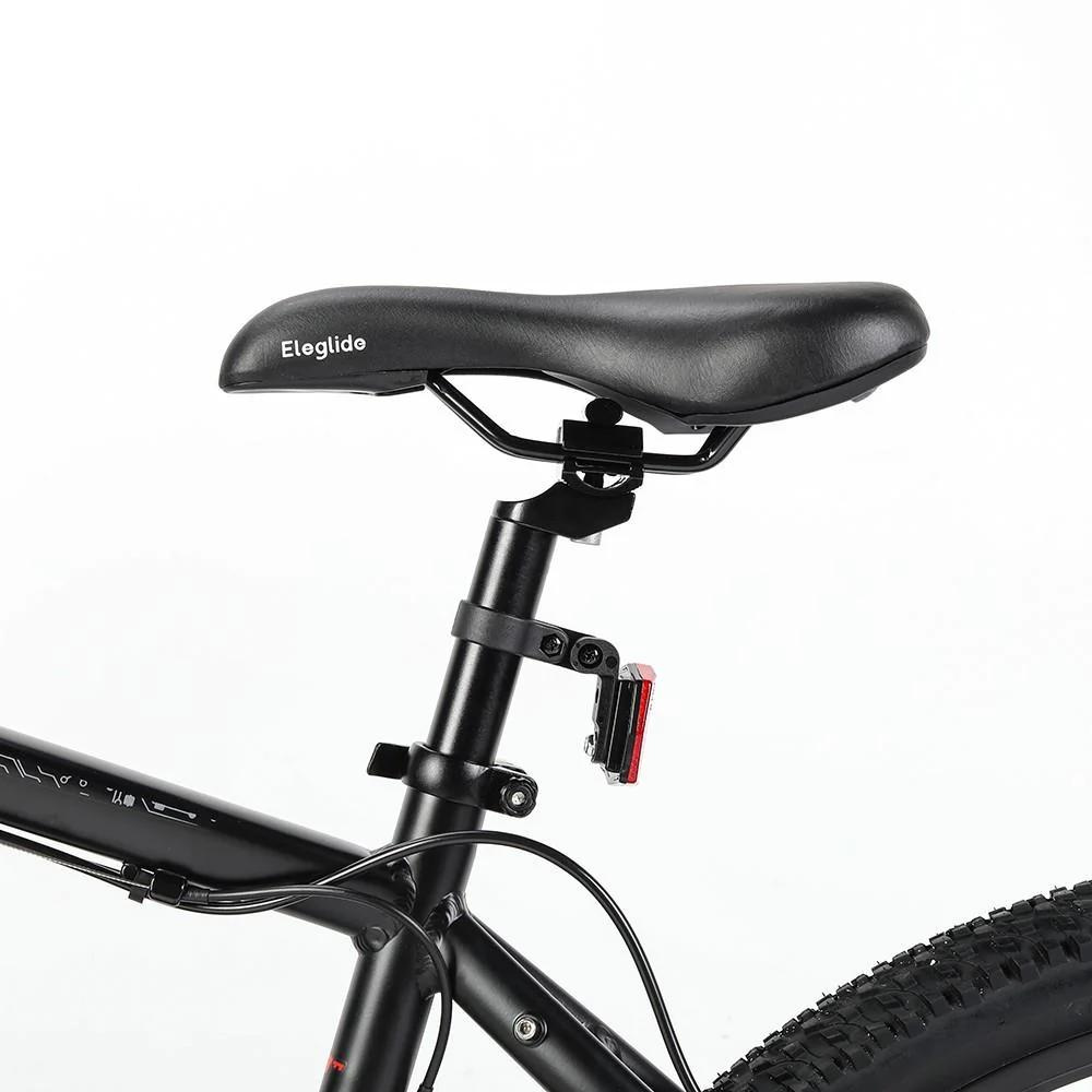 Eleglide M2 27.5" Electric Mountain Bike, 15.5MPH close up of the saddle in a white studio setting 