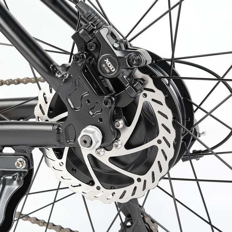 Eleglide M2 27.5" Electric Mountain Bike, 15.5MPH close up of the rear disc brake in a white studio setting 